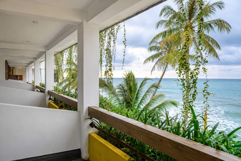 Open walkway and balcony planters looking over the Indian Ocean